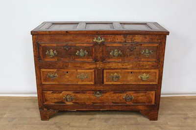 Lot 1425 - 18th century and later oak and fruitwood crossbanded mule chest, with hinged triple panel top over faux drawer frieze, with two short over one long drawer below on bracket feet