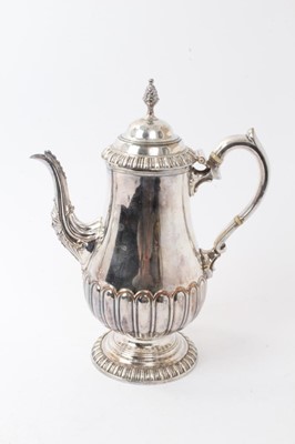 Lot 477 - Georgian Old Sheffield plate coffee pot of baluster form with fluted decoration, handle with ivory insulators, 31cm in overall height.  APHA Ref: J9MHJHNM