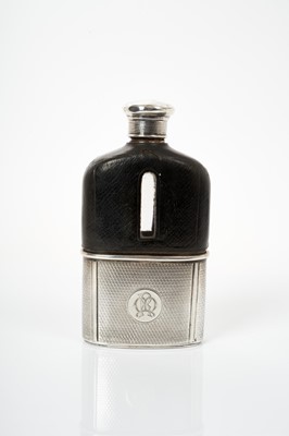 Lot 471 - Victorian silver hip flask with leather covered body, screw fitting cap and removable cup with engine turned decoration and engraved initials, (London 1868).