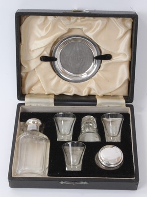 Lot 468 - 20th century silver plated travelling communion set in fitted case, marked A.B. EPNS, together with a silver mounted pot (London 1941).