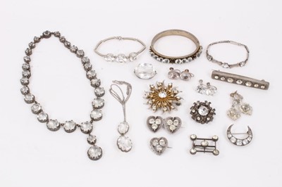 Lot 602 - Group of antique and later paste set silver and white metal jewellery to include a Victorian bar brooch, other brooches, three pairs of earrings, bangle, two bracelets and two necklaces