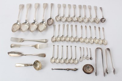 Lot 481 - Collection of Georgian and later silver flatware to include table spoons, teaspoons and others, all at approximately 30ozs