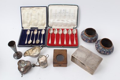 Lot 483 - George V silver cigarette box of rectangular form, (Birmingham 1929), together with a cased set of teaspoons, silver sauce boat and other silver and white metal items (various dates and makers).