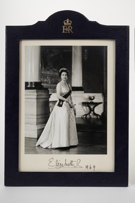 Lot 89 - H.M.Queen Elizabeth II and H.R.H.The Duke of Edinburgh, fine pair Signed presentation portrait photographs of the Royal couple taken at Buckingham Palace signed in ink on mount ' Elizabeth R 1969'...