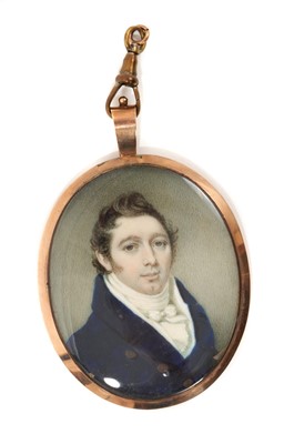 Lot 1014 - Fine quality early 19th century portrait miniature on ivory, depicting a gentleman with white cravat and blue coat, oval 6 x 5cm, in glazed gilt frame