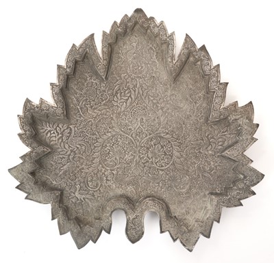 Lot 489 - Large Indian white metal tray / salver in the form of a leaf, decorated with leaves and birds, 38cm in length, all at 30ozs