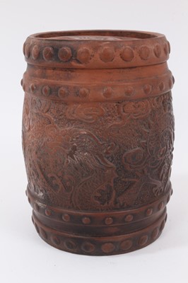 Lot 289 - A Chinese Yixing pottery tobacco jar / pot, decorated in relief with dragons, 16cm high