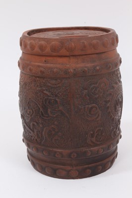 Lot 289 - A Chinese Yixing pottery tobacco jar / pot, decorated in relief with dragons, 16cm high