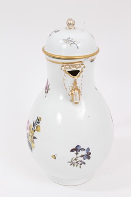 Lot 290 - A Meissen coffee pot, circa 1740, polychrome painted with floral sprays, with Tau handle and scrolled spout, crossed swords mark, 23.5cm high