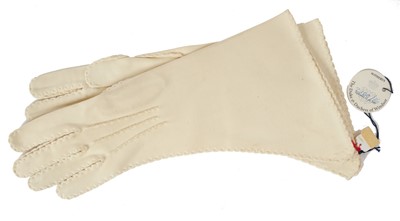 Lot 97 - Wallis Duchess of Windsor, pair very fine quality 1950s cream gauntlet gloves with very fine stitching and crimped borders, inventory label to interior and original Sotheby's part lot label for The...