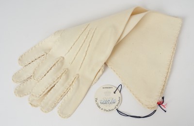 Lot 97 - Wallis Duchess of Windsor, pair very fine quality 1950s cream gauntlet gloves with very fine stitching and crimped borders, inventory label to interior and original Sotheby's part lot label for The...