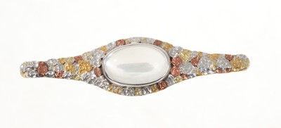 Lot 711 - Arts & Crafts handmade brooch with hammered patches of precious metals and set with a central oval moonstone