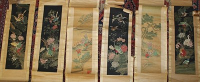 Lot 1053 - Six 19th century Chinese scrolls printed with exotic birds and flowers on black backgrounds