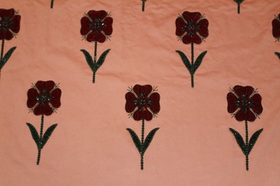 Lot 1054 - Length of fabric hand stitched with chenil and French jet onto appliqued velvet with stylised flowers