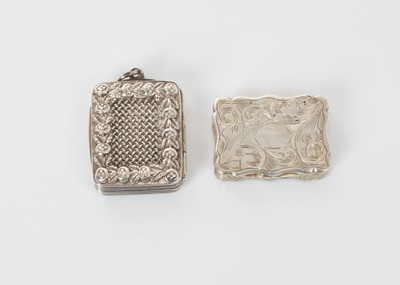 Lot 506 - George III silver vinaigrette of rectangular form with embossed decoration, gilded interior with pierced hinged grill, (Birmingham 1818), together with a Victorian silver vinaigrette (Birmingham 18...