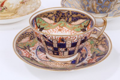 Lot 314 - Five early 19th century Coalport cups and saucers, various patterns, including floral painted and Imari style, some moulding