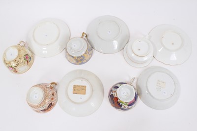 Lot 314 - Five early 19th century Coalport cups and saucers, various patterns, including floral painted and Imari style, some moulding