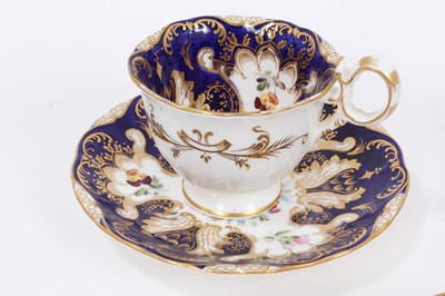 Lot 319 - Five early 19th century Coalport cups and saucers, including Imari style
