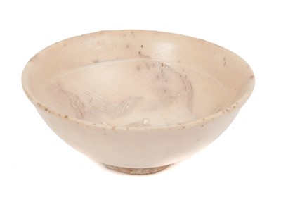 Lot 323 - A Chinese Song feather etched bowl with creamy glaze, 10cm diameter