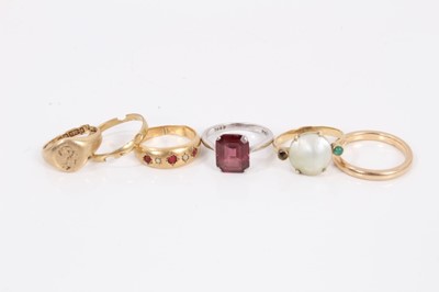 Lot 719 - Group of six gold rings a garnet single stone ring in 18ct white gold setting (6).