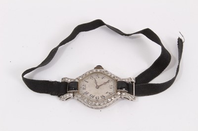 Lot 592 - Art Deco diamond and black onyx cocktail watch on black silk strap