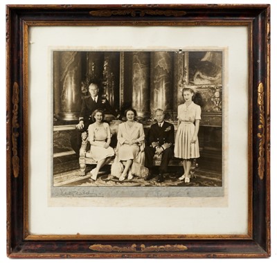 Lot 119 - Fine Late 1940s Dorothy Wilding portrait photograph of T.M.King George VI and Queen Elizabeth with their two daughters and Prince Philip at Buckingham Palace, signed by Dorothy Wilding in glazed fr...