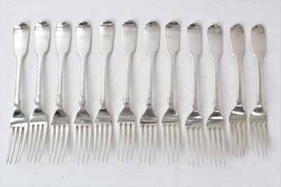 Lot 530 - Set of twelve Victorian silver fiddle pattern dessert forks, each with engraved crest, (London 1840)