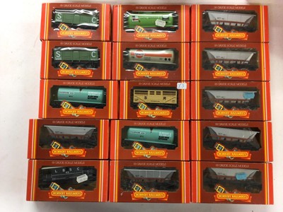 Lot 154 - Hornby OO Gauge rolling stock including Hopper (x14),Tank (x7), Coke (x3) Wagons plus animal, mineral, branded and Speedlink Vans and wagons, all boxed (34)
