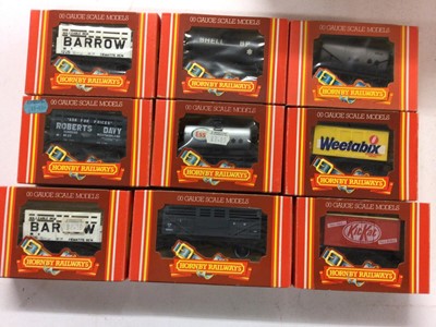 Lot 154 - Hornby OO Gauge rolling stock including Hopper (x14),Tank (x7), Coke (x3) Wagons plus animal, mineral, branded and Speedlink Vans and wagons, all boxed (34)