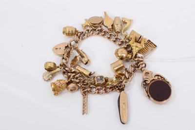 Lot 802 - 9ct gold charm bracelet