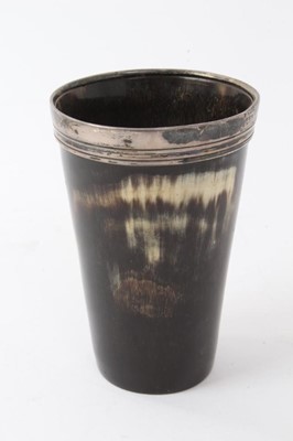 Lot 337 - Victorian horn beaker of tapered form with silver rim engraved 'Nelson Ellis', (London 1873), maker T. J, 9.2cm in height.