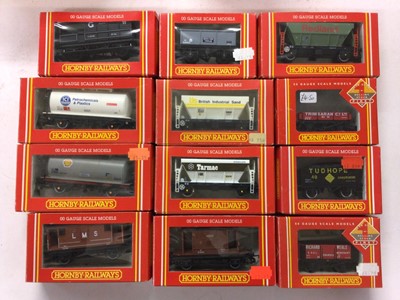 Lot 155 - Hornby OO gauge rolling stock including Top Link (x9) Banana Vans (x3), Open Wagons (x3), Railiner Curtain Sided Vans (x3) plus branded hopper, brake and tank wagons and vans, all boxed (40)