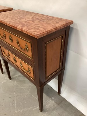 Lot 1480 - Good pair of Edwardian marble topped mahogany and satinwood bedside commodes, with two drawers, raised on square tapered legs and gilt sabots. Purchased Aspreys, mid 1960s