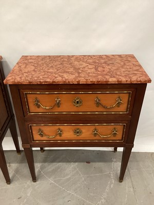 Lot 1480 - Good pair of Edwardian marble topped mahogany and satinwood bedside commodes, with two drawers, raised on square tapered legs and gilt sabots. Purchased Aspreys, mid 1960s