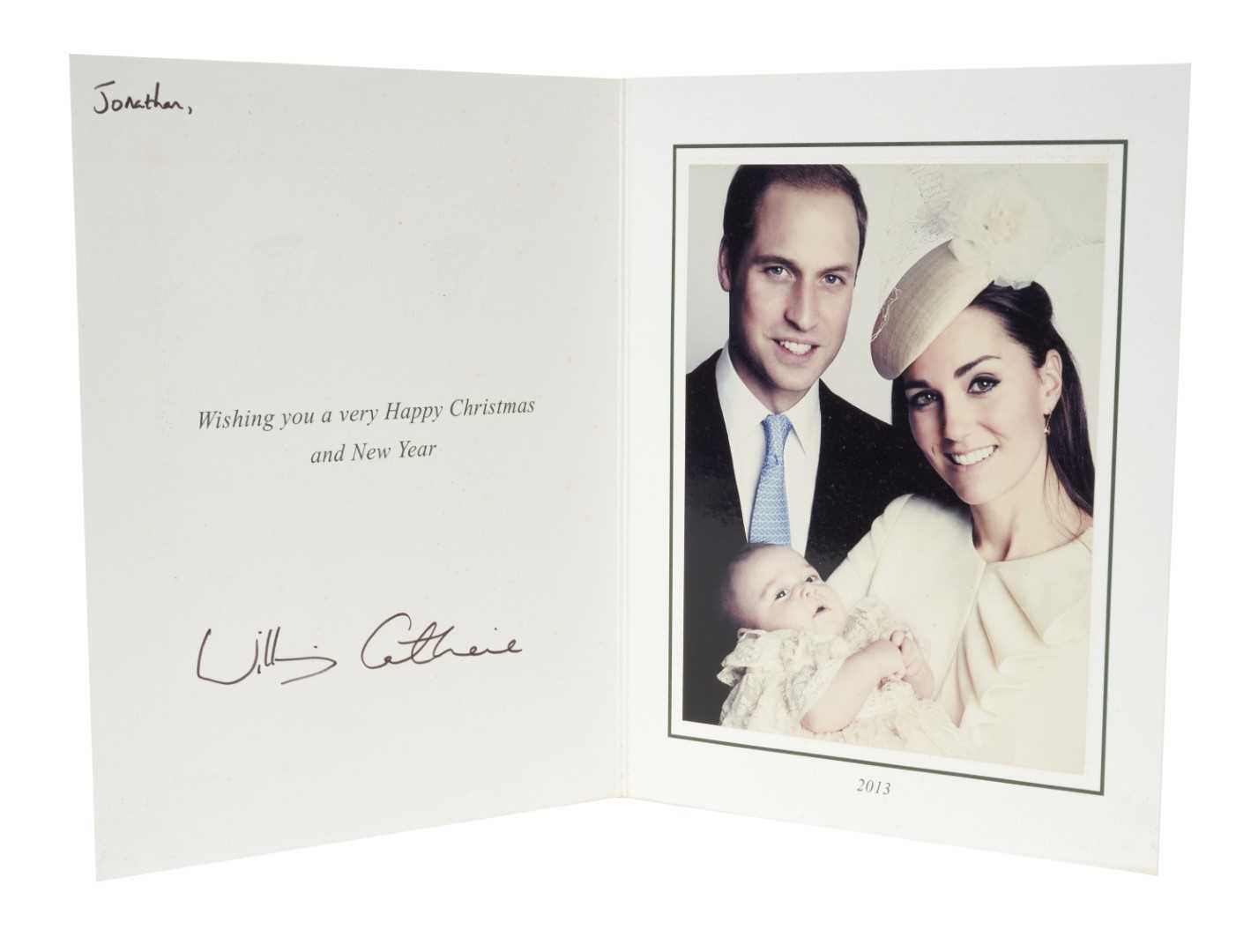 Lot 132 - T.R.H. The Duke and Duchess of Cambridge (now TRH The Prince and Princess of Wales) signed 2013 Christmas card with twin silvered ciphers to cover, charming photograph of Prince William and Catheri...