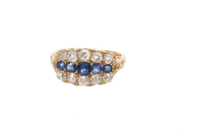 Lot 761 - Late Victorian sapphire and diamond ring with a line of five graduated mixed cut blue sapphires flanked by ten old cut diamonds on yellow gold shank, size K