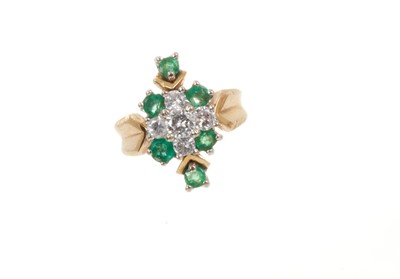 Lot 762 - Emerald and diamond cluster ring in 18ct gold setting