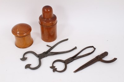 Lot 1045 - Two Georgian steel sugar cutters, steel compasses and two fruitwood flasks