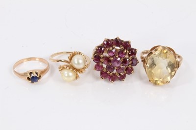Lot 54 - Two 9ct gold gem set cocktail rings, 14ct gold cultured pearl cross over ring and one other 14ct gold ring