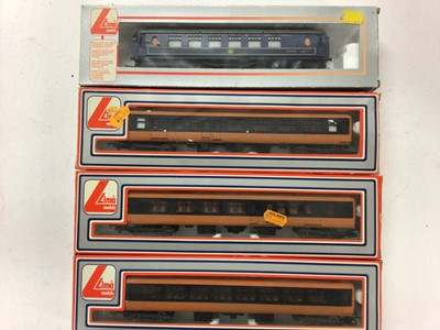 Lot 161 - Lima OO gauge carriages including Continental Sleeping car (wrong box), CIE orange/black coaches 305307 (x2) & 305306, plus four other coaches and five parcel vans (x5), all boxed (13)
