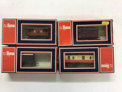 Lot 162 - Lima OO gauge rolling stock including a selection of open and closed vans and wagons, all boxed (20)