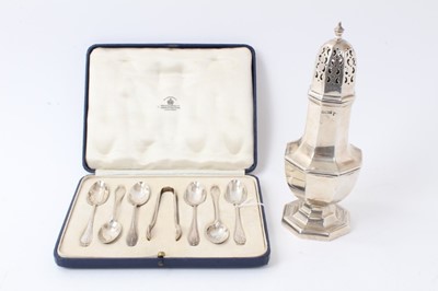 Lot 551 - Edwardian silver sugar castor of octagonal form with pierced slip in cover, (Sheffield 1909), maker Walker & Hall, together with a set of six George V