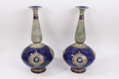 Lot 377 - A large pair of Doulton Lambeth vases