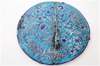 Lot 122 - Antique Islamic tin glazed pottery charger...