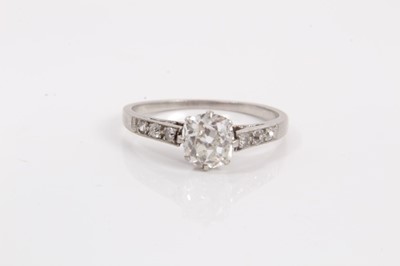 Lot 823 - Platinum diamond single stone ring with an old cut cushion shape diamond