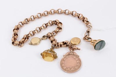 Lot 833 - Late Victorian 9ct gold large belcher link watch chain with various fobs