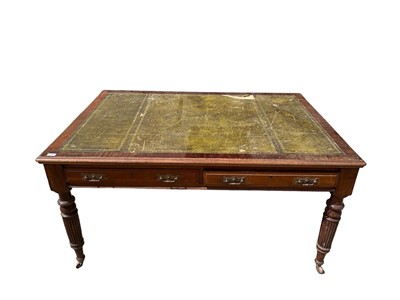 Lot 71 - Edwardian oak library table, with inset tooled leather top and two frieze drawers to each side on reeded supports and castors, 151cm wide x 106cm deep x 78cm high