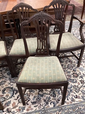 Lot 1496 - Set of six Hepplewhite style mahogany dining chairs, each with arched pierced splat back and slip in seat on square legs and stretchers, including two carvers