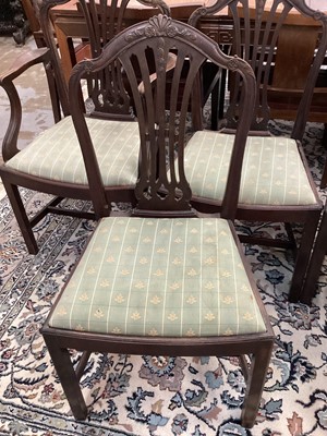 Lot 1496 - Set of six Hepplewhite style mahogany dining chairs, each with arched pierced splat back and slip in seat on square legs and stretchers, including two carvers