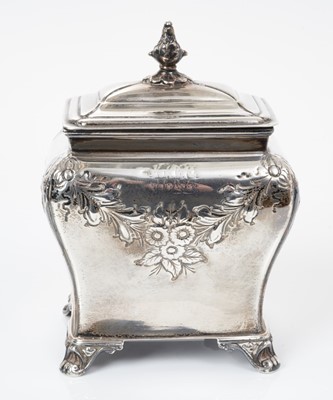 Lot 553 - Victorian silver tea caddy of bombe form with chased floral and foliate decoration, raised on four bracket feet, (London 1895), maker Henry Stratford, 9ozs, 15cm in height.